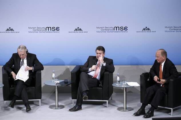 MUNICH, GERMANY - FEBRUARY 18, 2017: France s Foreign Minister Jean-Marc Ayrault and Germany s Foreign Minister Sigmar Gabriel (L-R) attend the 53rd Munich Security Conference. Alexander Shcherbak TASS  TS041BC6