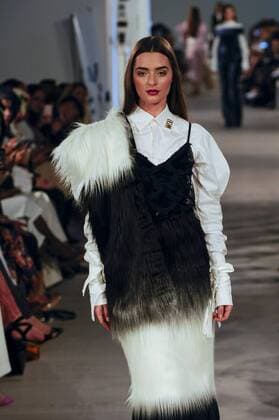 February 18, 2017 - London, UK - London, UK. A model presents a look by FiziWoo (Malaysia) at the UK s first London Modest Fashion Week taking place this weekend at the Saatchi Gallery. The two day event sees 40 brands from across the world come together to showcase their collections for Muslim and other religious women. London UK  - ZUMAl94_ 20170218_zaf_l94_045 Copyright: xStephenxChungx