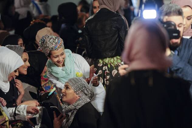 February 18, 2017 - London, UK - London, UK. Excited members of the audience await the first catwalk of the day at the UK s first London Modest Fashion Week taking place this weekend at the Saatchi Gallery. The two day event sees 40 brands from across the world come together to showcase their collections for Muslim and other religious women. London UK  - ZUMAl94_ 20170218_zaf_l94_037 Copyright: xStephenxChungx