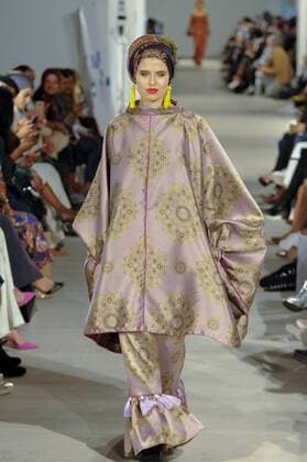 February 18, 2017 - London, UK - London, UK. A model presents a look by Tuhfah (Malaysia) at the UK s first London Modest Fashion Week taking place this weekend at the Saatchi Gallery. The two day event sees 40 brands from across the world come together to showcase their collections for Muslim and other religious women. London UK  - ZUMAl94_ 20170218_zaf_l94_046 Copyright: xStephenxChungx