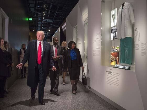 February 21, 2017 - Washington, District of Columbia, United States of America - United States President Donald Trump, joined by Dr. Ben Carson and his wife Candy, visit the Ben Carson exhibit as they tour the Smithsonian National Museum of African American History & Culture in Washington, D.C. on February 21, 2017. Photo Credit: CNP AdMedia Washington United States of America - ZUMAa123 20170221_zaa_a123_017 Copyright: xKevinxDietschx