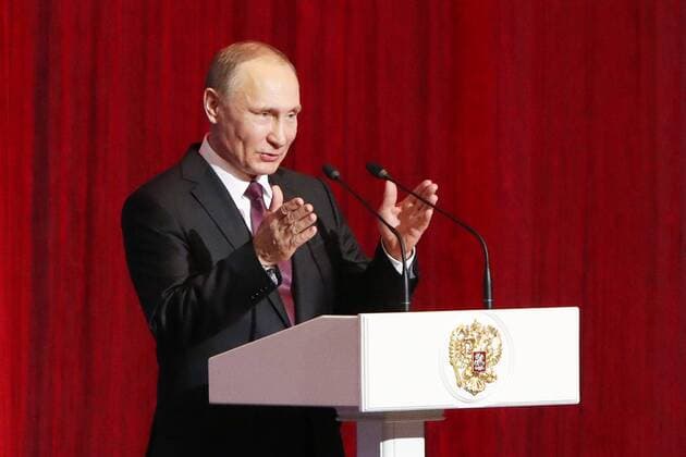 MOSCOW, RUSSIA - FEBRUARY 23, 2017: Russiaâ€™s President Vladimir Putin addresses a concert marking Defender of the Fatherland Day at Moscowâ€™s Kremlin. Vyacheslav Prokofyev TASS  TS042585