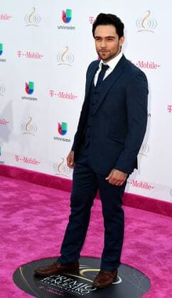 Latin artist Isaac Reys walks the red carpet at the Univision 2017 Premio Lo Nuestro a La Música Latina show at the American Airlines Arena in Miami,Florida, February 23, 2017.  MIA20170223115 GARYxIxROTHSTEIN
