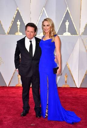 Michael J. Fox and Tracy Pollan arrive on the red carpet for the 89th annual Academy Awards at the Dolby Theatre in the Hollywood section of Los Angeles on February 26, 2017.  LAP2017022725 KEVINxDIETSCH
