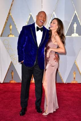 Actor Dwayne The Rock Johnson (L) and Lauren Hashian arrive on the red carpet for the 89th annual Academy Awards at the Dolby Theatre in the Hollywood section of Los Angeles on February 26, 2017.  LAP2017022733 KEVINxDIETSCH