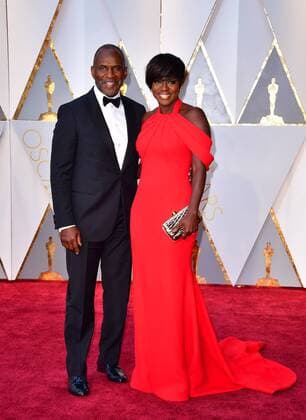 Viola Davis (R) and Julius Tennon arrive on the red carpet for the 89th annual Academy Awards at the Dolby Theatre in the Hollywood section of Los Angeles on February 26, 2017.  LAP2017022764 KEVINxDIETSCH