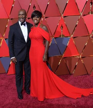 Actors Viola Davis (R) and Julius Harris arrive on the red carpet for the 89th annual Academy Awards at the Dolby Theatre in the Hollywood section of Los Angeles on February 26, 2017.  LAP20170226830 JIMxRUYMEN