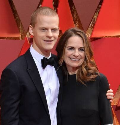 Actor Lucas Hedges (L) and his mother Susan Bruce Titman arrive on the red carpet for the 89th annual Academy Awards at the Dolby Theatre in the Hollywood section of Los Angeles on February 26, 2017.  LAP20170226866 JIMxRUYMEN