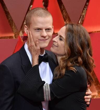 Actor Lucas Hedges (L) and his mother Susan Bruce Titman arrive on the red carpet for the 89th annual Academy Awards at the Dolby Theatre in the Hollywood section of Los Angeles on February 26, 2017.  LAP20170226868 JIMxRUYMEN