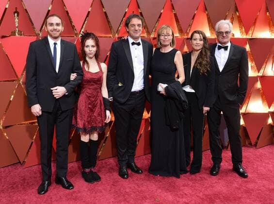 Sound editor Sylvain Bellemare (C) arrives on the red carpet for the 89th annual Academy Awards at the Dolby Theatre in the Hollywood section of Los Angeles on February 26, 2017.  LAP20170226424 JIMxRUYMEN