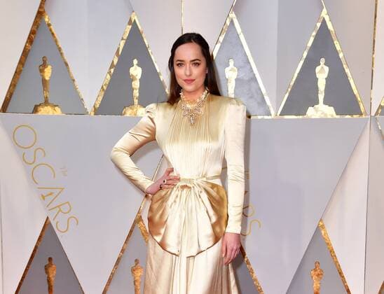 Dakota Johnson arrives on the red carpet for the 89th annual Academy Awards at the Dolby Theatre in the Hollywood section of Los Angeles on February 26, 2017.  LAP2017022833 KEVINxDIETSCH