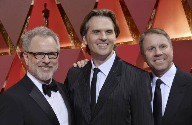 (L-R) Directors Rich Moore, Byron Howard and Jared Bush arrive on the red carpet for the 89th annual Academy Awards at the Dolby Theatre in the Hollywood section of Los Angeles on February 26, 2017.  LAP20170226439 JIMxRUYMEN