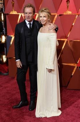 Musician Sting (R) and producer Trudie Styler arrive on the red carpet for the 89th annual Academy Awards at the Dolby Theatre in the Hollywood section of Los Angeles on February 26, 2017.  LAP20170226090 JIMxRUYMEN