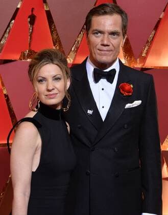 Actors Michael Shannon (R) and Kate Arrington arrive on the red carpet for the 89th annual Academy Awards at the Dolby Theatre in the Hollywood section of Los Angeles on February 26, 2017.  LAP20170226941 JIMxRUYMEN