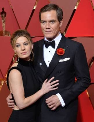 Actors Michael Shannon (R) and Kate Arrington arrive on the red carpet for the 89th annual Academy Awards at the Dolby Theatre in the Hollywood section of Los Angeles on February 26, 2017.  LAP20170226942 JIMxRUYMEN