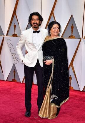Dev Patel and his mother Anita arrive on the red carpet for the 89th annual Academy Awards at the Dolby Theatre in the Hollywood section of Los Angeles on February 26, 2017.  LAP2017022837 KEVINxDIETSCH