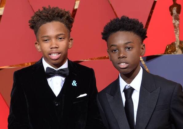 Actors Jaden Piner (L) and Alex R. Hibbert arrive on the red carpet for the 89th annual Academy Awards at the Dolby Theatre in the Hollywood section of Los Angeles on February 26, 2017.  LAP20170226462 JIMxRUYMEN
