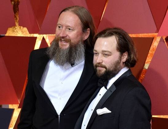 Director David Mackenzie (L) and film editor Jake Roberts arrive on the red carpet for the 89th annual Academy Awards at the Dolby Theatre in the Hollywood section of Los Angeles on February 26, 2017.  LAP20170226467 JIMxRUYMEN