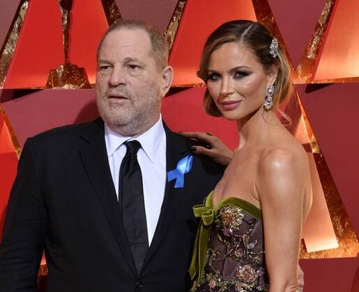 Producer Harvey Weinstein (L) and designer Georgina Chapman arrive on the red carpet for the 89th annual Academy Awards at the Dolby Theatre in the Hollywood section of Los Angeles on February 26, 2017.  LAP20170226093 JIMxRUYMEN