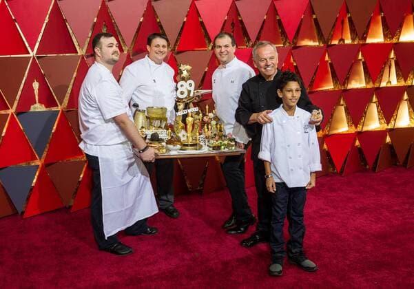 (170227) -- LOS ANGELES, Feb. 26, 2017 -- Oscar dinner chef Wolfgang Puck (2nd R) arrives for the red carpet of the 89th Academy Awards at the Dolby Theater in Los Angeles, the United States, on Feb. 26, 2017. )(gj) U.S.-LOS ANGELES-OSCAR-RED CARPET YangxLei 
