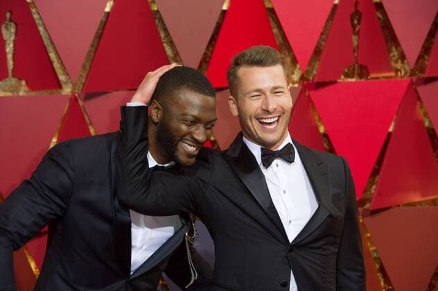 (170227) -- LOS ANGELES, Feb. 26, 2017 -- U.S. actors Aldis Hodge (L) and Glen Powell arrive for the red carpet of the 89th Academy Awards at the Dolby Theater in Los Angeles, the United States, on Feb. 26, 2017. )(gj) U.S.-LOS ANGELES-OSCAR-RED CARPET YangxLei 