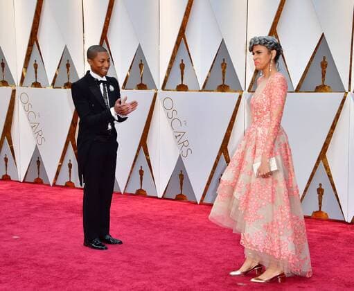 Pharrell Williams and Mimi Valdes arrive on the red carpet for the 89th annual Academy Awards at the Dolby Theatre in the Hollywood section of Los Angeles on February 26, 2017.  LAP2017022881 KEVINxDIETSCH