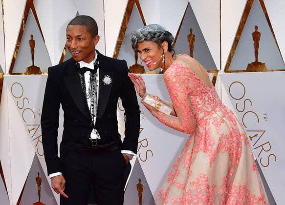 Pharrell Williams and Mimi Valdes arrive on the red carpet for the 89th annual Academy Awards at the Dolby Theatre in the Hollywood section of Los Angeles on February 26, 2017.  LAP2017022883 KEVINxDIETSCH