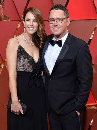 Greig Fraser (R) and guest arrive on the red carpet for the 89th annual Academy Awards at the Dolby Theatre in the Hollywood section of Los Angeles on February 26, 2017.  LAP20170226487 JIMxRUYMEN