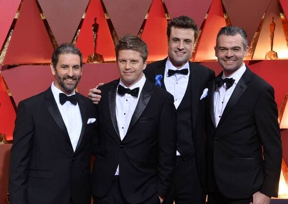 (L-R) Visual effects artists Brad Schiff, Steve Emerson, Brian McLean and Oliver Jones arrive on the red carpet for the 89th annual Academy Awards at the Dolby Theatre in the Hollywood section of Los Angeles on February 26, 2017.  LAP20170226497 JIMxRUYMEN