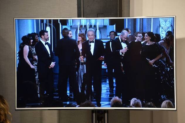 Presenter Warren Beatty is seen on a press room screen, trying to explain how La La Land was announced as Best Picture only to be corrected to Moonlight , at the 89th annual Academy Awards at Lowes Hollywood Hotel in the Hollywood section of Los Angeles on February 26, 2017.  LAP20170226119 JIMxRUYMEN