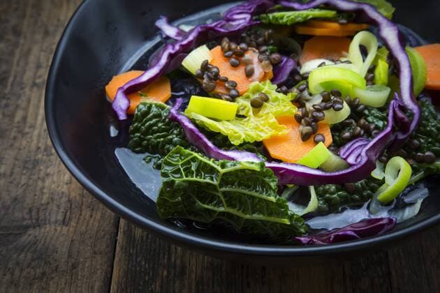 Bowl of vegan cabbage stew with lentils, partial view  LVF05877
