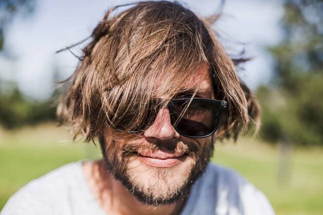 Portrait of a man with unkempt hair wearing sunglasses model released Symbolfoto  WVF00832