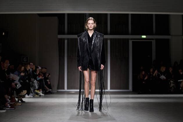 A model presents a creation of Chinese designer brand RICOSTRU during Milan Fashion Week Fall Winter 2017 2018 in Milan, Italy on Feb. 27, 2017. ) ITALY-MILAN-FASHION WEEK-RICOSTRU JinxYu 