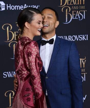 Model Chrissy Teigen and singer John Legend attend the premiere of the motion picture romantic musical fantasy Beauty and the Beast at the El Capitan Theatre in the Hollywood section of Los Angeles on March 2, 2017. Storyline: A young prince, imprisoned in the form of a beast, can be freed only by true love. What may be his only opportunity arrives when he meets Belle, the only human girl to ever visit the castle since it was enchanted.  LAP2017030240 JIMxRUYMEN