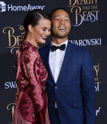 Model Chrissy Teigen and singer John Legend attend the premiere of the motion picture romantic musical fantasy Beauty and the Beast at the El Capitan Theatre in the Hollywood section of Los Angeles on March 2, 2017. Storyline: A young prince, imprisoned in the form of a beast, can be freed only by true love. What may be his only opportunity arrives when he meets Belle, the only human girl to ever visit the castle since it was enchanted.  LAP2017030241 JIMxRUYMEN