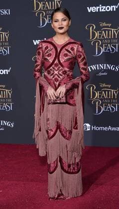 Model Chrissy Teigen attends the premiere of the motion picture romantic musical fantasy Beauty and the Beast at the El Capitan Theatre in the Hollywood section of Los Angeles on March 2, 2017. Storyline: A young prince, imprisoned in the form of a beast, can be freed only by true love. What may be his only opportunity arrives when he meets Belle, the only human girl to ever visit the castle since it was enchanted.  LAP2017030243 JIMxRUYMEN