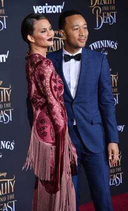 Model Chrissy Teigen and singer John Legend attend the premiere of the motion picture romantic musical fantasy Beauty and the Beast at the El Capitan Theatre in the Hollywood section of Los Angeles on March 2, 2017. Storyline: A young prince, imprisoned in the form of a beast, can be freed only by true love. What may be his only opportunity arrives when he meets Belle, the only human girl to ever visit the castle since it was enchanted.  LAP2017030244 JIMxRUYMEN