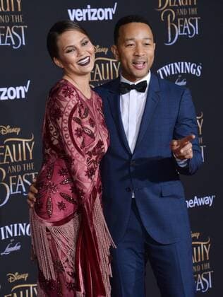Model Chrissy Teigen and singer John Legend attend the premiere of the motion picture romantic musical fantasy Beauty and the Beast at the El Capitan Theatre in the Hollywood section of Los Angeles on March 2, 2017. Storyline: A young prince, imprisoned in the form of a beast, can be freed only by true love. What may be his only opportunity arrives when he meets Belle, the only human girl to ever visit the castle since it was enchanted.  LAP2017030245 JIMxRUYMEN