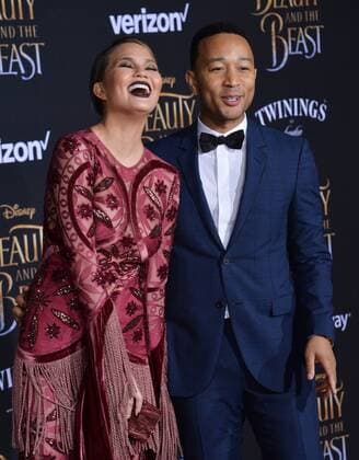 Model Chrissy Teigen and singer John Legend attend the premiere of the motion picture romantic musical fantasy Beauty and the Beast at the El Capitan Theatre in the Hollywood section of Los Angeles on March 2, 2017. Storyline: A young prince, imprisoned in the form of a beast, can be freed only by true love. What may be his only opportunity arrives when he meets Belle, the only human girl to ever visit the castle since it was enchanted.  LAP2017030246 JIMxRUYMEN