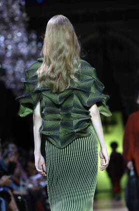 A model takes to the catwalk during the presentation of Issey Miyake s show as part of the Fall-Winter 2017-18 Paris Fashion Week on March 3, 2017.  PAR20170303113 MAYAxVIDON-WHITE