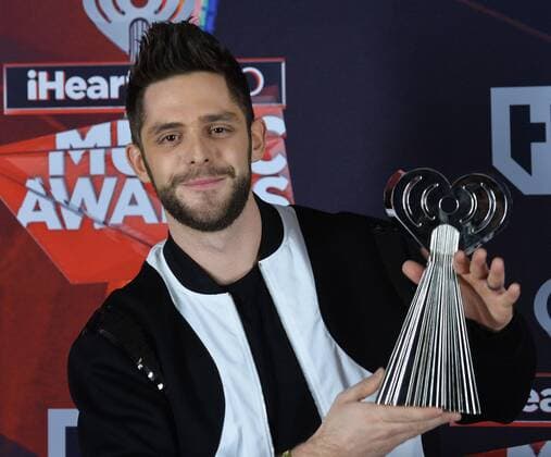 Singer-songwriter Thomas Rhett, winner of the Country Artist of the Year award appears backstage at the iHeartRadio Music Awards at The Forum in Inglewood, California on March 5, 2017. The show was broadcast live on Turner s TBS, TNT, and truTV .  LAP2017030508 JIMxRUYMEN