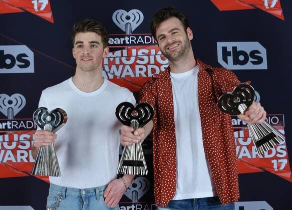 Recording artists Andrew Taggart (L) and Alex Pall of music group The Chainsmokers, winners of the Best New Artist award, Dance Song of the Year award for Closer, and Best New Pop Artist award appear backstage during the iHeartRadio Music Awards at The Forum in Inglewood, California on March 5, 2017. The show was broadcast live on Turner s TBS, TNT, and truTV .  LAP2017030516 JIMxRUYMEN