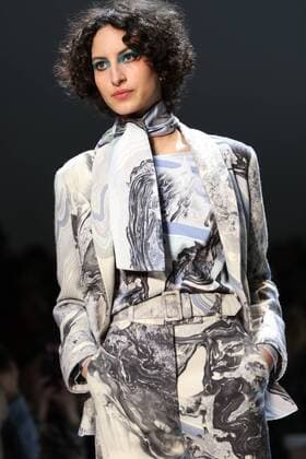 A model takes to the catwalk during the presentation of Leonard Paris show as part of the Fall-Winter 2017-18 Paris Fashion Week on March 6, 2017.  PAR20170306101 MAYAxVIDON-WHITE