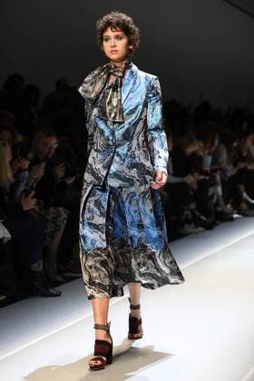 A model takes to the catwalk during the presentation of Leonard Paris show as part of the Fall-Winter 2017-18 Paris Fashion Week on March 6, 2017.  PAR20170306109 MAYAxVIDON-WHITE