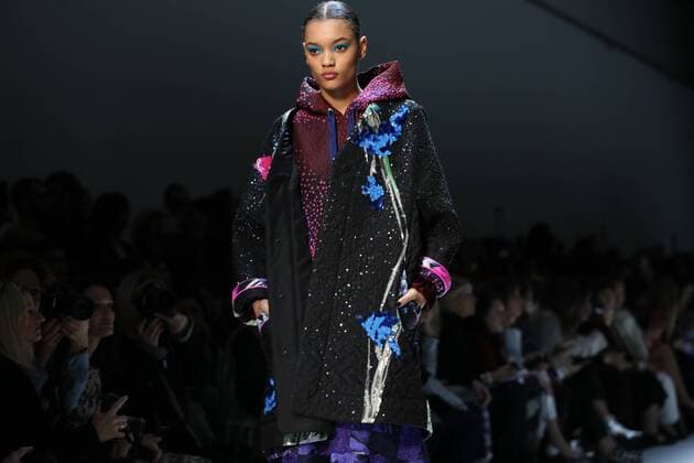 A model takes to the catwalk during the presentation of Leonard Paris show as part of the Fall-Winter 2017-18 Paris Fashion Week on March 6, 2017.  PAR20170306121 MAYAxVIDON-WHITE