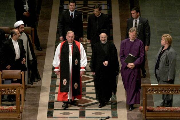 Sept. 7, 2006 - U.S. - Former Iranian President Mohammad Khatami (center) arrives at the National Cathedral with Rev. Samuel T Lloyd III, dean of the Washington National Cathedral, (center right) and Rev. John Bryson Chane, bishop of Washington, (center left) in Washington, D.C., Thursday, September 7, 2006. ( MCT) - ZUMAm67_ 20060907_baf_m67_063 Copyright: xAndrewxCouncillx