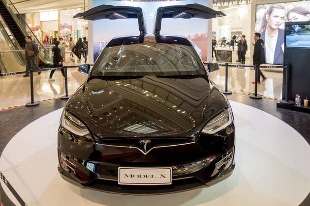 March 9, 2017 - Shanghai, Shanghai, China - Shanghai, CHINA-March 9 2017: (EDITORIAL USE ONLY. CHINA OUT)..A black Tesla Model X shows at a shopping mall in Shanghai, March 9th, 2017. The Tesla Model X is a full-sized, all-electric, luxury, crossover SUV made by Tesla Inc. that uses falcon wing doors for access to the second and third row seats. Shanghai China  - ZUMAs145 20170309_zaa_s145_095 Copyright: xWangxGangx