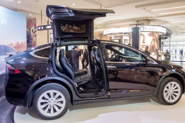 March 9, 2017 - Shanghai, Shanghai, China - Shanghai, CHINA-March 9 2017: (EDITORIAL USE ONLY. CHINA OUT)..A black Tesla Model X shows at a shopping mall in Shanghai, March 9th, 2017. The Tesla Model X is a full-sized, all-electric, luxury, crossover SUV made by Tesla Inc. that uses falcon wing doors for access to the second and third row seats. Shanghai China  - ZUMAs145 20170309_zaa_s145_093 Copyright: xWangxGangx