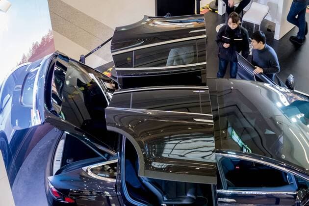 March 9, 2017 - Shanghai, Shanghai, China - Shanghai, CHINA-March 9 2017: (EDITORIAL USE ONLY. CHINA OUT)..A black Tesla Model X shows at a shopping mall in Shanghai, March 9th, 2017. The Tesla Model X is a full-sized, all-electric, luxury, crossover SUV made by Tesla Inc. that uses falcon wing doors for access to the second and third row seats. Shanghai China  - ZUMAs145 20170309_zaa_s145_103 Copyright: xWangxGangx
