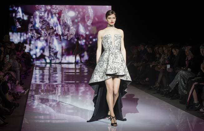 (170311) -- TORONTO, March 11, 2017 -- A model presents a collection by Shelli Oh during the debut season of the Toronto Women s Fashion Week in Toronto, Canada, March 10, 2017. The three-day event will showcase collections of about 20 designers from around the world. ) (djj) CANADA-TORONTO-WOMEN S FASHION WEEK ZouxZheng 